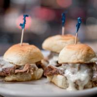 French Dip Sliders · thinly sliced roast beef topped w/ horsey sauce, & swiss cheese served on kings hawaiian rol...