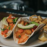 Shrimp Tacos · flour tortillas filled w/ fried shrimp, honey slaw, tomatoes, cilantro, fresh squeezed lime ...