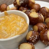 Pretzels And Beer Cheese · Jumbo pretzel sticks served with homemade beer cheese.