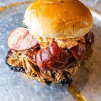 Smoke Stack Sammich · A Big A$$ Stack of Brisket, Pulled Pork, and Housemade Sausage, topped with pimento cheese &...