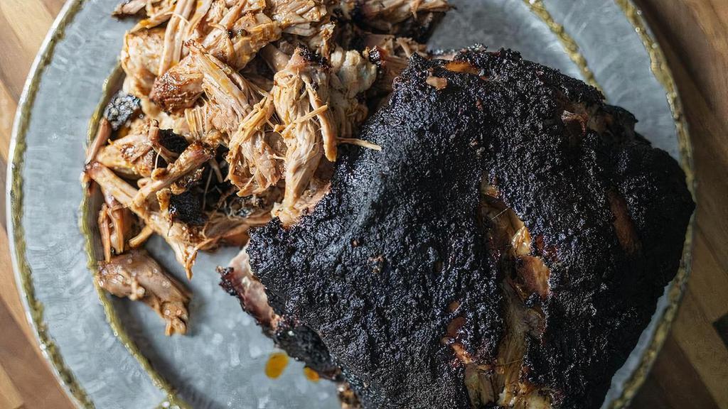 **Pulled Pork · 1/2 lb. Sold by 1/2 lb. increments. If you'd like more please increase the quantity.. Dry rubbed & smoked over hickory & oak for up to 4 hrs.