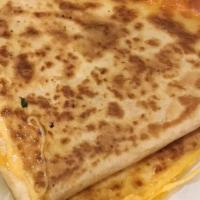 Cheese Quesadilla · Marinated chicken simmered in our own pico de gallo placed in a flour tortilla with melted c...