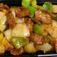 Pepper Steak · Stir fried steak with vegetables and a savory sauce.