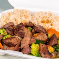 Hibachi Steak · Serve with Broccoli, Carrot, Zucchini & Onion 
Fried Rice  And one White Sauce .