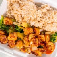 Hibachi Shrimp · Serve with Broccoli, Carrot, Zucchini & Onion 
Fried Rice  And one White Sauce .