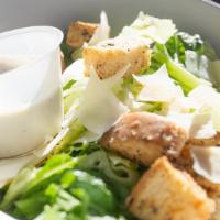 Caesar Salad · Baby romaine hearts, shaved parmesan reggiano, house made focaccia croutons, and Caesar dres...