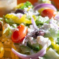Greek Salad · Gluten free. Baby romaine hearts, tomatoes, red onion, cucumbers, feta cheese, kalamata oliv...