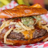 Cowboy Burger · Certified angus beef patty, onion straws, cheddar cheese, applewood smoked bacon, BBQ sauce,...