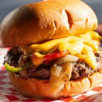 Montreal Steak Burger · Certified angus beef patty, Montreal steak seasoning, American cheese, caramelized onions an...