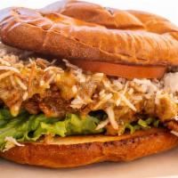 Fried Chicken (Coconut Style) · Fried breast of chicken tossed with honey mustard and topped with toasted coconut, lettuce, ...