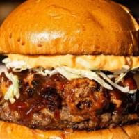 Tar Heel Burger · Certified Angus beef patty, smoked pulled pork, AD's BBQ sauce, pimento cheese, slaw on a br...