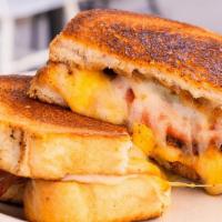 6 Cheese Grilled Cheese · Gouda, cheddar, American, provolone, pepper jack and swiss cheeses with bacon, roasted tomat...