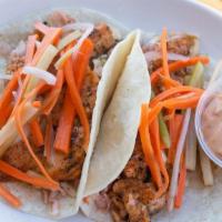 Salmon Tacos · Blackened or Grilled salmon, Yucatan slaw, house pickled veggies, side of chipotle aioli