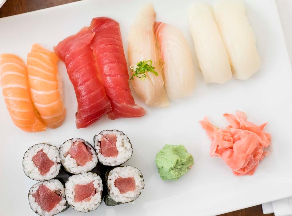 Sushi Regular · Chef's choice of 10 pieces sushi and tuna roll. Served with soup and salad.