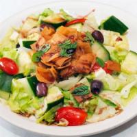 Fattoush Salad · Vegetarian. Lettuce, Cucumbers, Tomatoes, Mint, Fried Pita Chips & Pomegranate Dressing