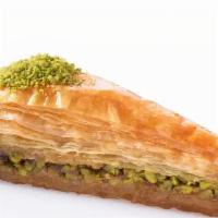 Turkish Baklava · A Carrot Slice of Thin Filo Dough Filled with Crushed Turkish Pistachios, Drenched with Simp...