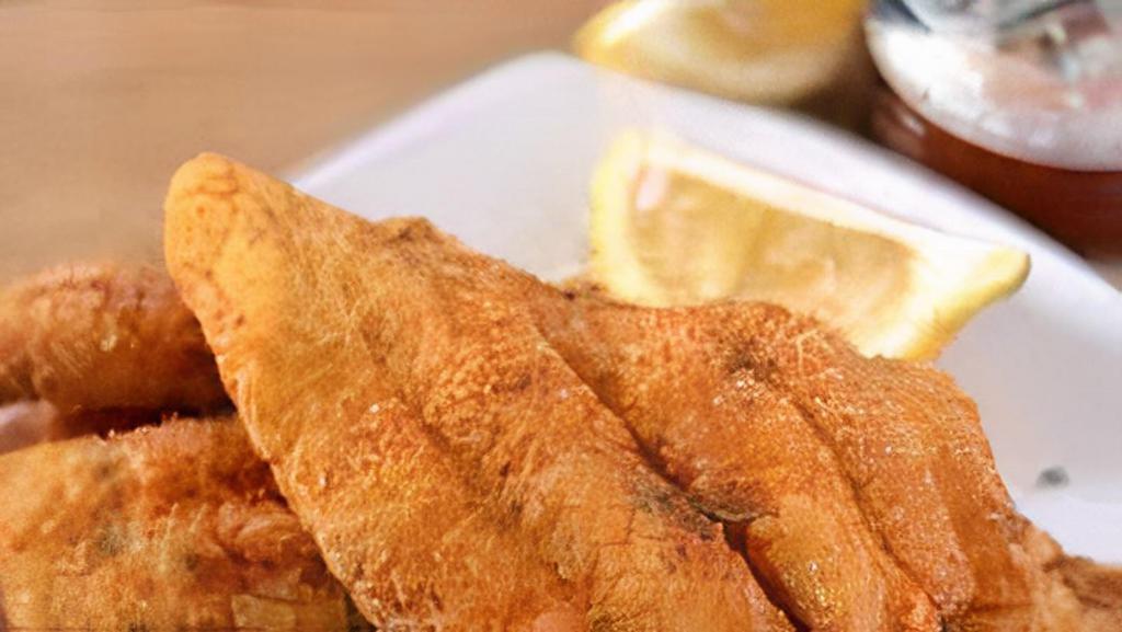 Catfish Dinner · Served with hush puppies, fries and coleslaw