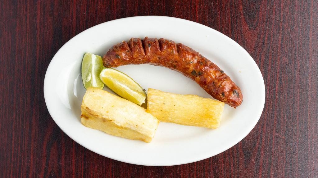 Chorizo Con Arepa O Tostones · Colombian sausage served with arepa or green plantain.