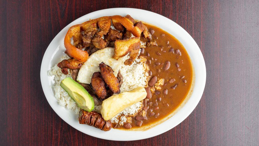 Bandeja Paisa · Rice, beans, grilled top round steak, sausage, pork rind, arepa, eggs, sweet plantains, avocado and yucca.