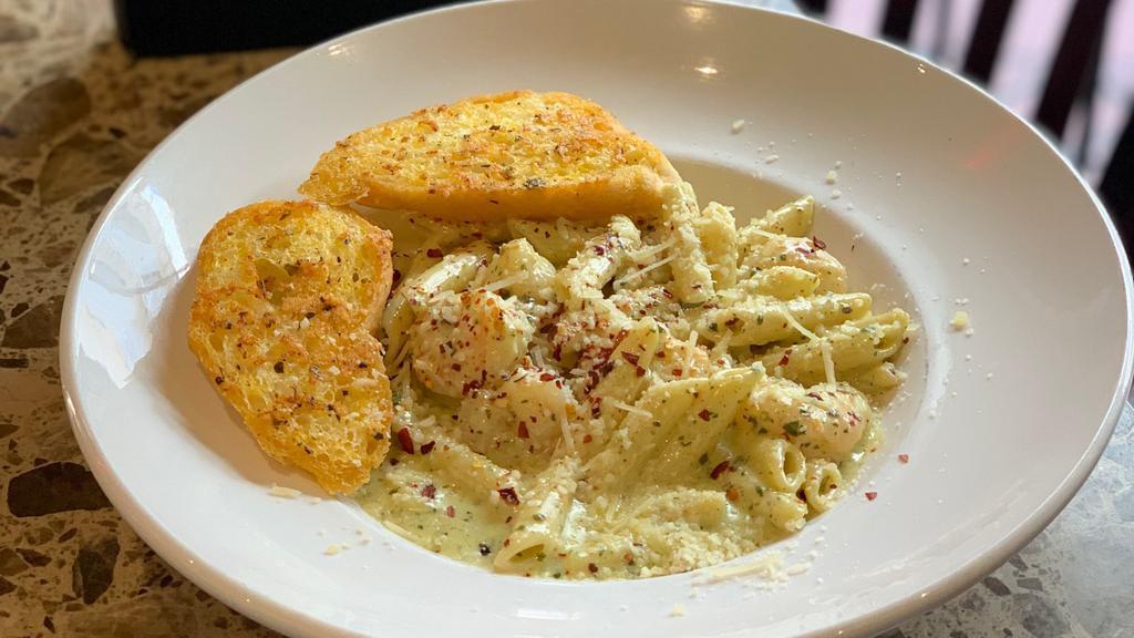 Gulf Shrimp Ya-Ya Pasta · Fresh Gulf shrimp and grape tomatoes sautéed in our Cajun pesto, tossed with penne pasta, served with garlic toast.