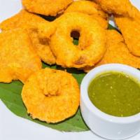 Assorted Bajji (Vegan, Gluten-Free) · Fresh onion, plantain and potato vegetables sliced, battered & fried, served with mint chutn...