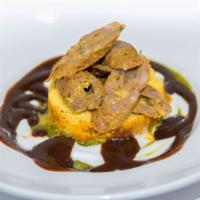 Lamb Chaat (Gluten Free) · Shish kebab of lamb, grilled turkish style, placed on curried chickpeas and sev, drizzled wi...