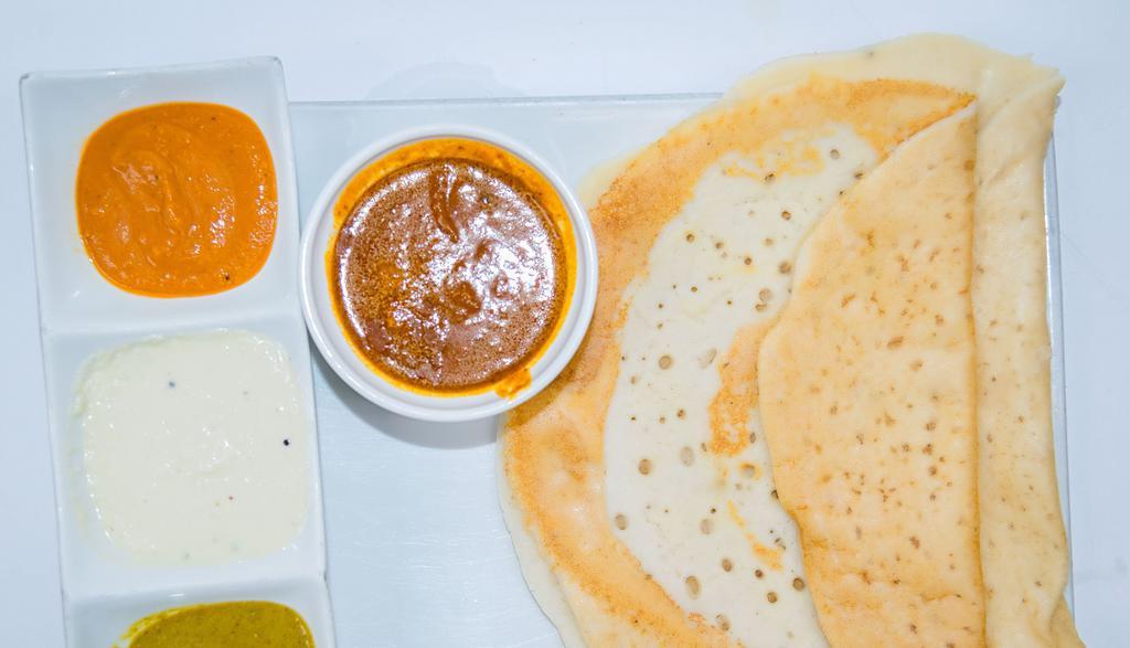 Kal Or Set Dosa (Gluten Free , Vegetarian) · Served with chutneys and sambar (lentil sauce).