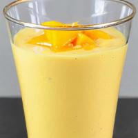 Mango Lassi · Traditional yogurt based drink, 12 oz serving.