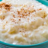 Rice Pudding · Rice, milk, cream and sugar, slow cooked and served.