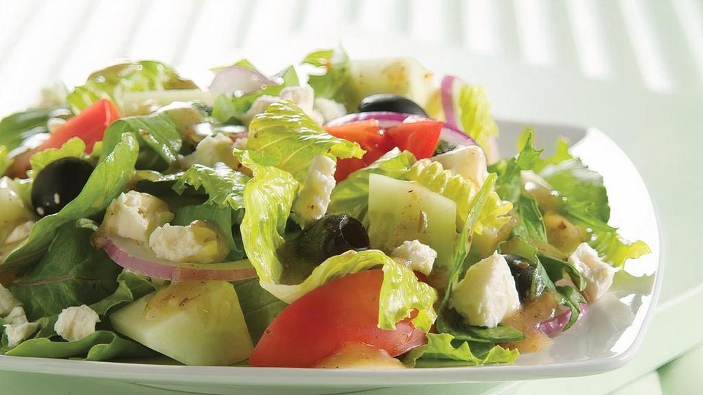 Greek Salad · Crisp romaine lettuce, tomato, cucumber, red onion, kalamata olives, pepperoncini peppers topped with Feta cheese. served with greek vinaigrette
