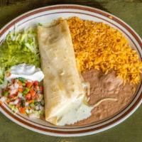 Chimichanga · Stuffed flour tortillas with your choice of beef or chicken, deep-fried to a golden brown an...