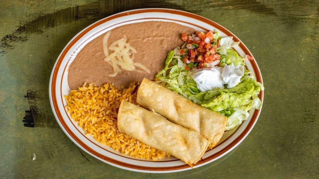 Taquitos Mexicanos · Four beef or chicken rolled corn tortillas served with lettuce, guacamole, sour cream, and pico de gallo.