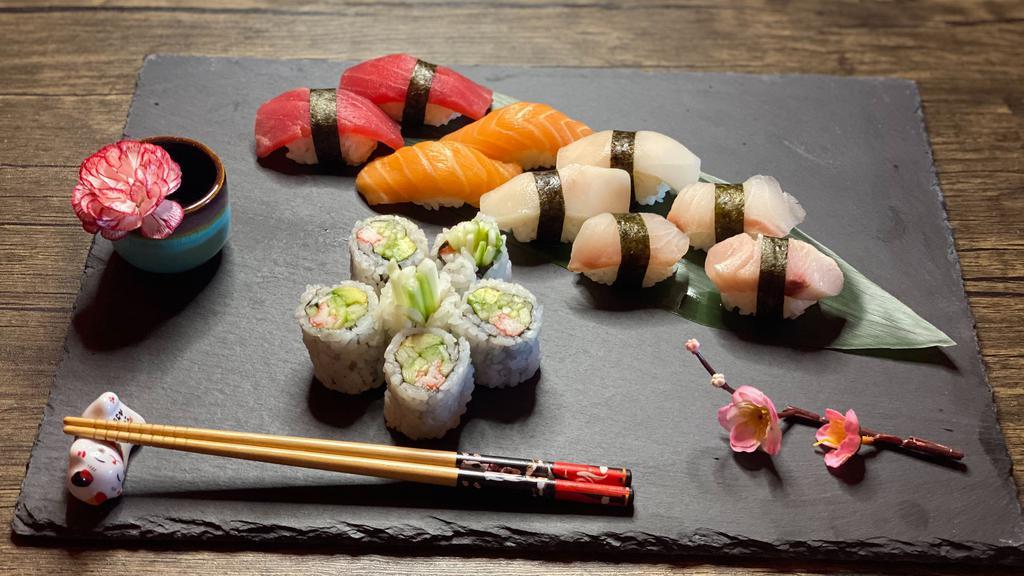Sushi Dinner · 9 pieces of chef choice sushi with California roll.