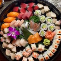 Yama Love Boat · 15 pieces of sushi & 15 pieces of sashimi with ANY TWO special roll