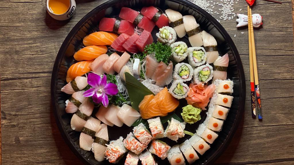 Yama Love Boat · 15 pieces of sushi & 15 pieces of sashimi with ANY TWO special roll
