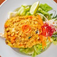 Pineapple Fried Rice · A fancier fried rice dish - combines fragrance of jasmine rice with eggs, sweet, juicy and t...