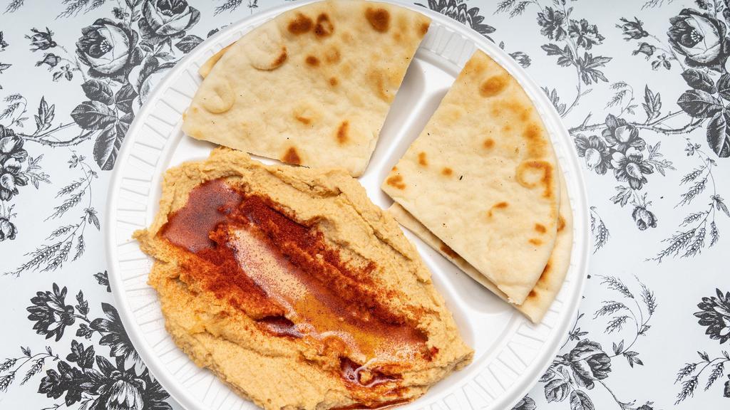 Hummus · With pita bread.