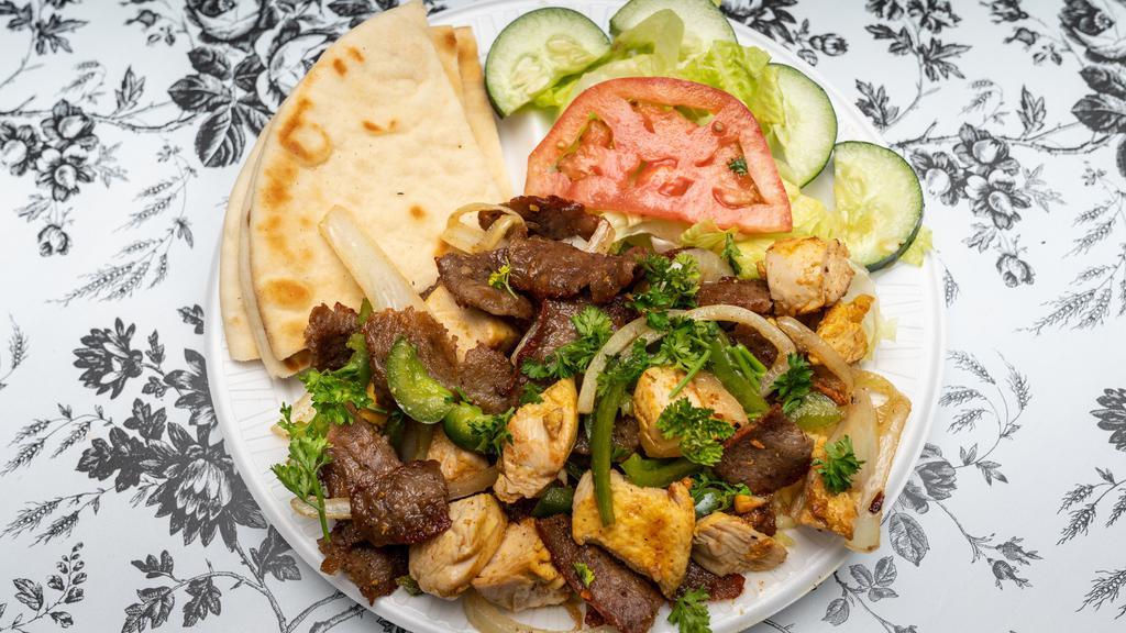 Mixed Grill · Gyros and chicken with grilled onions and green peppers.