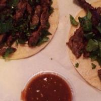 Steak Taco · Fresh from the grill, with your choice of flour or corn tortilla, with pico de gallo or cila...