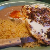 Chori Pollo · Thin sliced chicken breast grilled and topped with Mexican chorizo, onions and cheese dip. S...