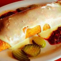 Cuban Burrito · We have converted this classic sandwich into a delicious burrito. A 12