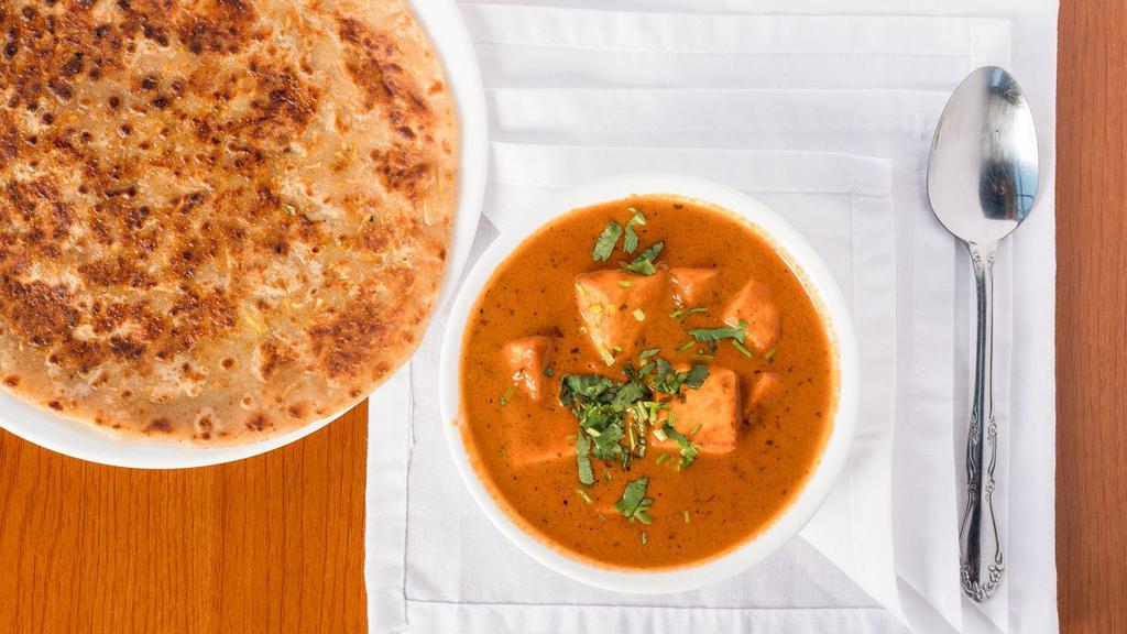 Paneer Tikka Masala · Indian Cottage Cheese cooked with Traditional Indian Spices in a Fresh Ginger & Garlic Curry.