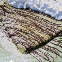 The Nutella · Scratch made crepe drizzled with glorious Nutella and finished with powdered sugar.