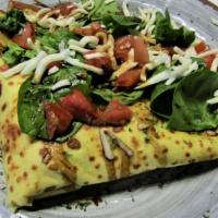 Caprese Crepe · Scratch made crepe topped with fresh spinach, diced tomatoes, house made pesto, mozzarella c...