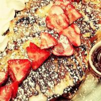 Cinnamon Roll French Toast · 4 huge slices of house made French toast sprinkled w/cinnamon & drizzled w/our house made ci...