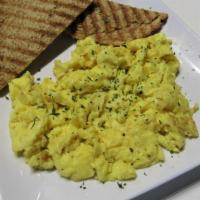 Kid’S Scambled Eggs & Toast · 3 scrambled eggs and toast.