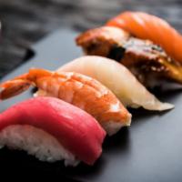 Sashimi Sampler · 6 pieces of Chef's Choice Sashimi.