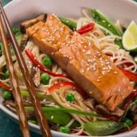 Salmon Teppan Bowl · A delicious bowl filled with Salmon, mixed vegetables, noodles, and fried rice.