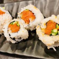 Spicy Tuna Sushi Roll · A delicious sushi roll made with nori (dried seaweed), rice, raw tuna, and spicy mayo.