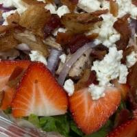 Strawberry Fields Salad · Romaine lettuce, fresh strawberries, fresh blueberries, walnuts, bacon, red onions, feta che...